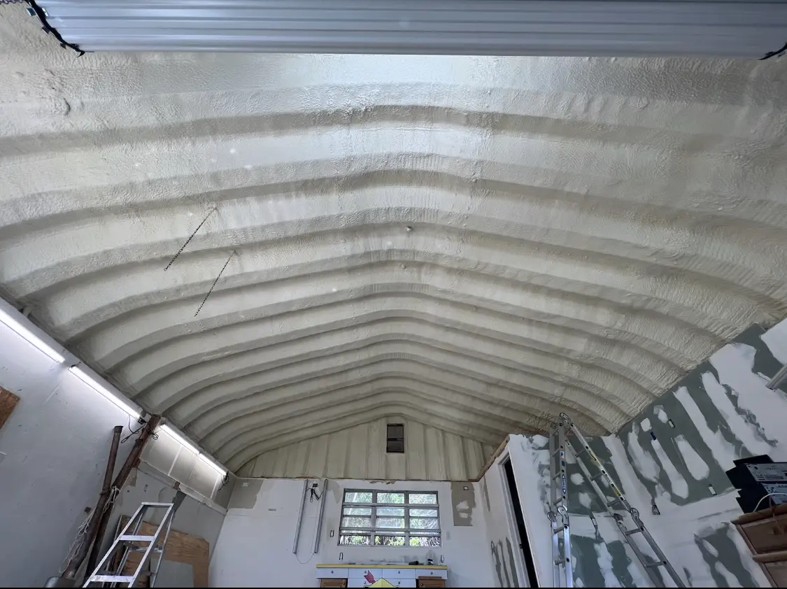 Spray polyurethane foam applied to the underside of a metal roof deck in Pueblo